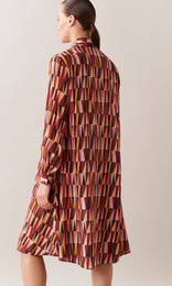 Pyramid pure Italian silk crepe de chine V-neck long cuff sleeve trapeze midi dress with neck tie in rhubarb red, berry, and peach orange geometric print design