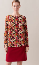 Adelma luxurious Italian silk crepe de chine crew neck gathered long cuff sleeve blouse in red, tan and mocha brown graphic geometric print