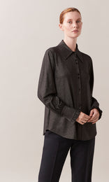 Luccia luxurious stretch viscose sparkle wide sleeve cuff and ruffle sleeve hem collared button down shirt with sparkle edged button detail in black