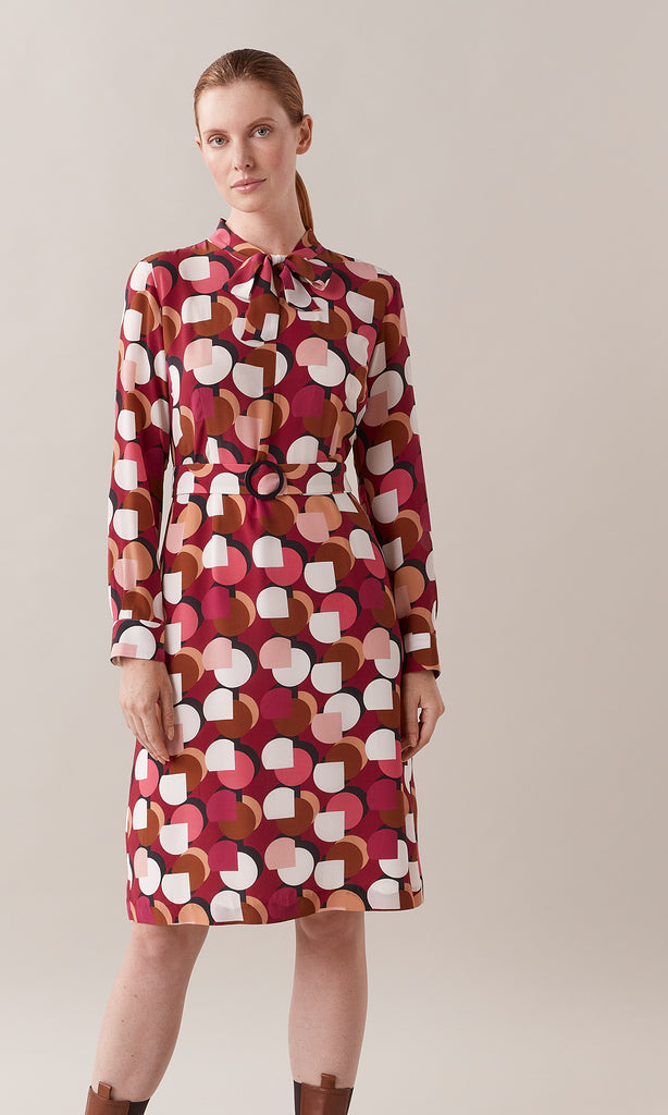 Redcliffe luxurious pure Italian silk crepe de chine belted neck tie long sleeve midi shift dress in rhubarb red, berry and crème ivory white graphic geometric print