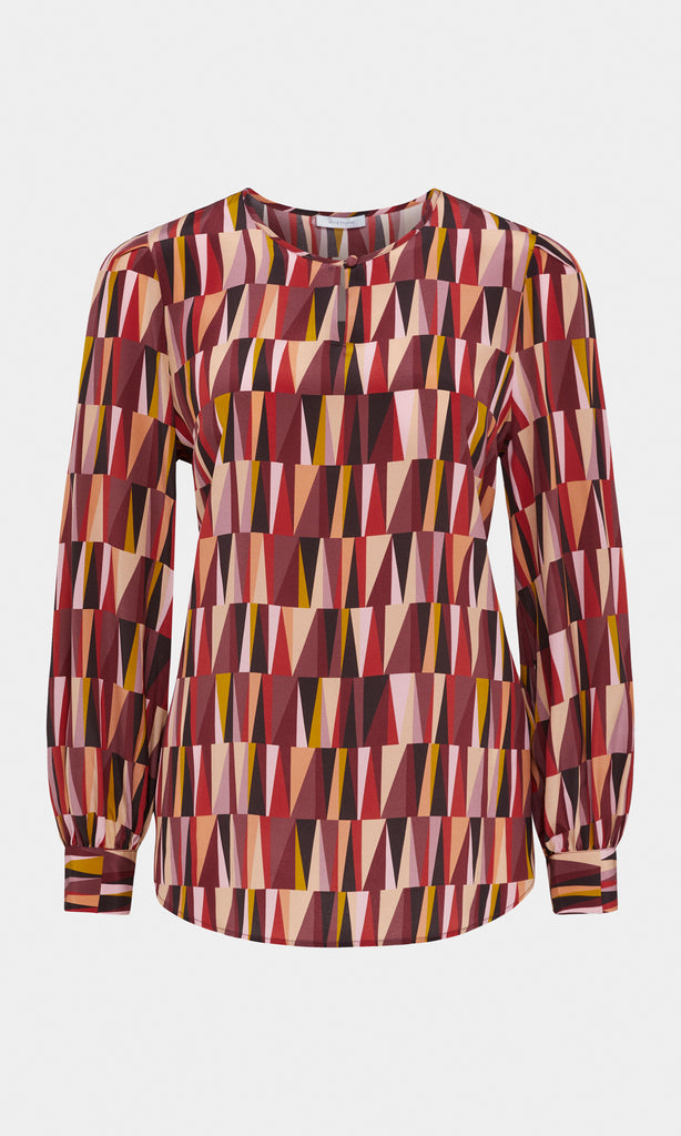 Pyramid Italian pure silk crepe de chine crew neck gathered long wide cuff sleeve blouse with neck keyhole opening in rhubarb red, berry, and peach orange geometric print design